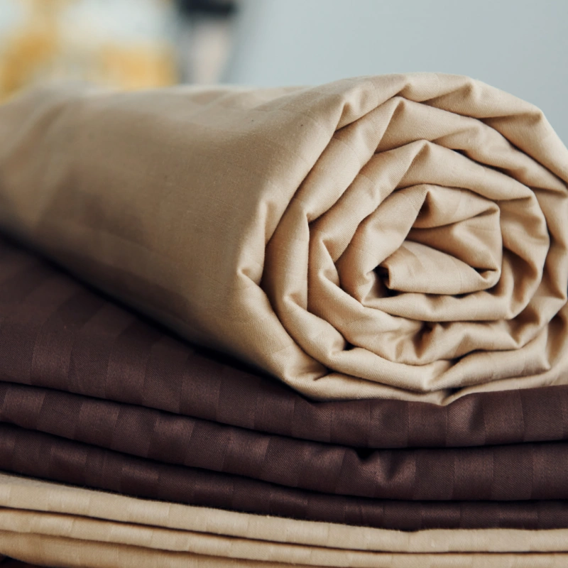 Close-up of premium cotton sateen fabric woven by Velara Textiles