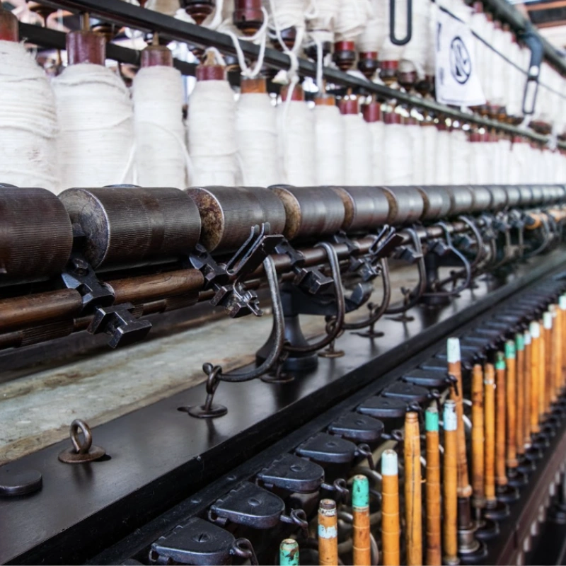 Cotton yarn weaving process at Velara Textiles, Faisalabad